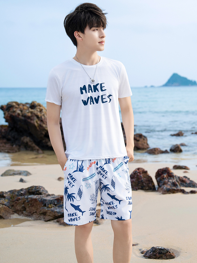 Verano secado rápido suelto pantalón de playa hombre deportivo flores pantalones cortos pareja pantalones casuales pantalones de cama fábrica al por mayor