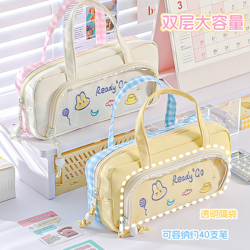 2025年の新型高颜値マカロンの両面は色の手にぶつかって筆袋の大容量の学生のかわいい文房具の箱を持ちます。|undefined
