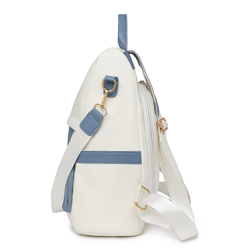 Mochila antirrobo para mujer 2024 nueva moda en contraste color mochila de cercanías de gran capacidad para mujer mochila con borlas multifuncional