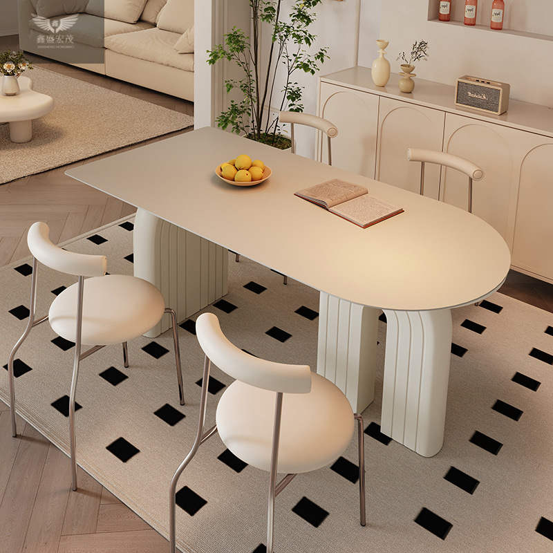 Mesa y silla de comedor de estilo francés de estilo crema de viento de roca, mesa de comedor de la península de diseño moderno y simple.