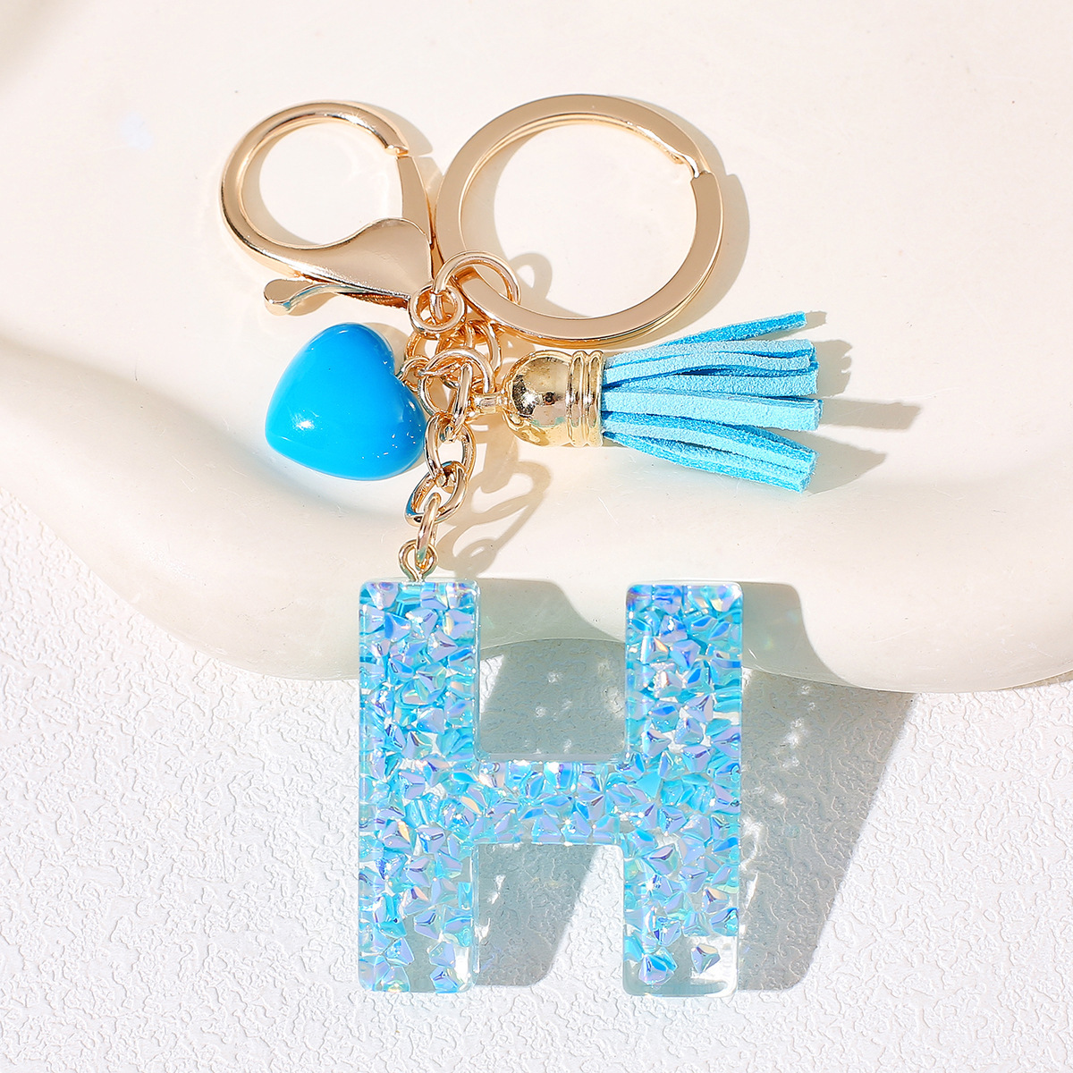 Nuevos productos azules de amor con frascos de letras lindos enclavadores decoraciones europeas y americanas populares llaveros damas