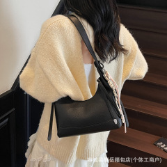 高级感包包女2025新款秋季黑色百搭手提单肩斜挎包设计包月牙包
