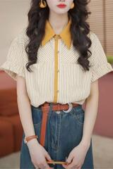 代年夏の新型香港風レトロな色合わせ半袖シャツの女性服はゆったりとしていて、デザイン感があります。