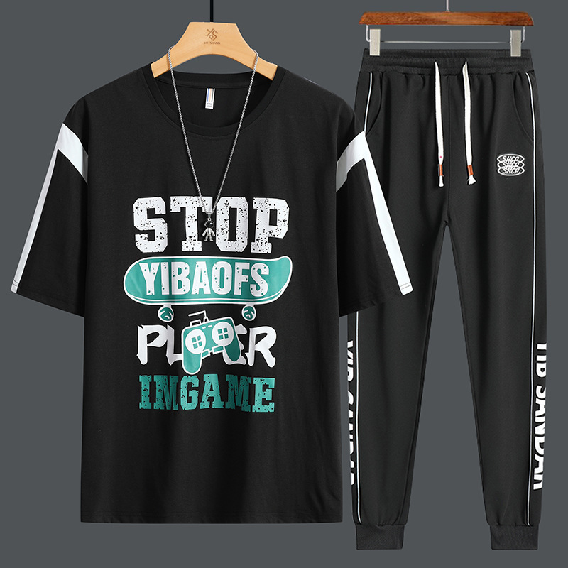 Conjunto de dos piezas de camiseta de cuello redondo holgada y deportiva informal juvenil de moda para el verano 2025 con pantalones y traje de manga corta para hombre