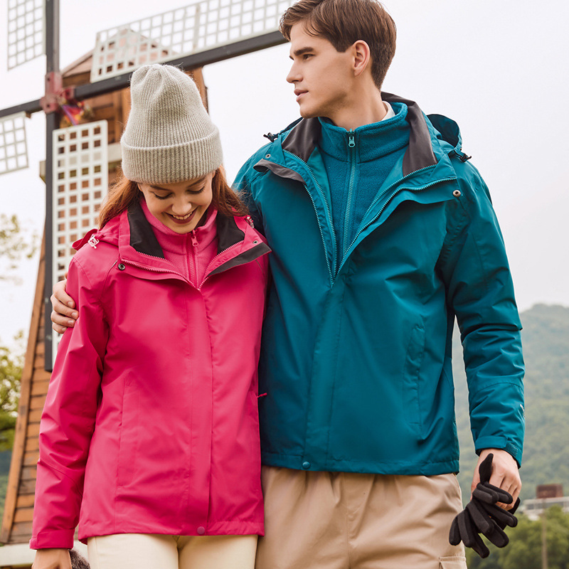Chaqueta de pareja de doble pieza forro polar sombrero chaqueta a prueba de viento a prueba de lluvia deportes al aire libre moda casual ventas directas de fábrica