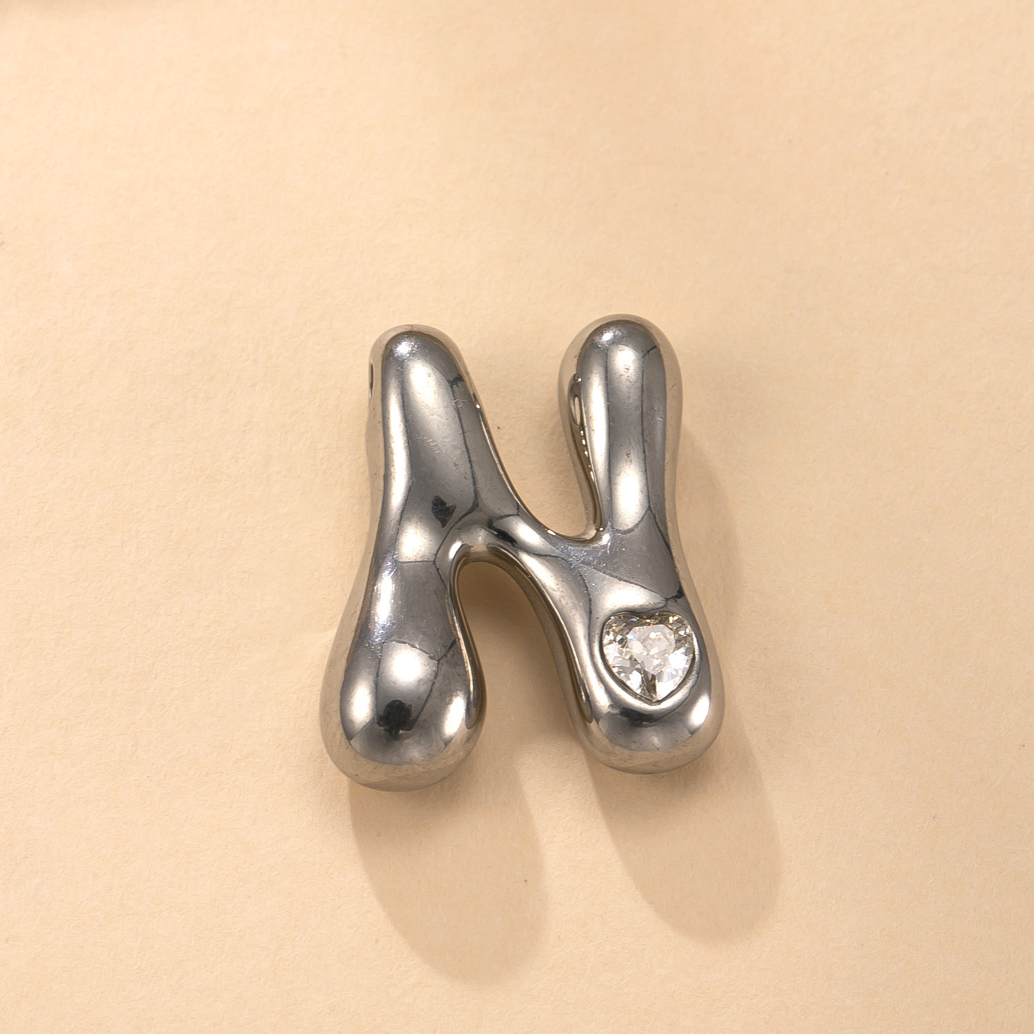 Colgante único transfronterizo de joyería de acero inoxidable fundición con incrustaciones de diamantes de color 26 letras accesorios de collar moda simple pulsera briy