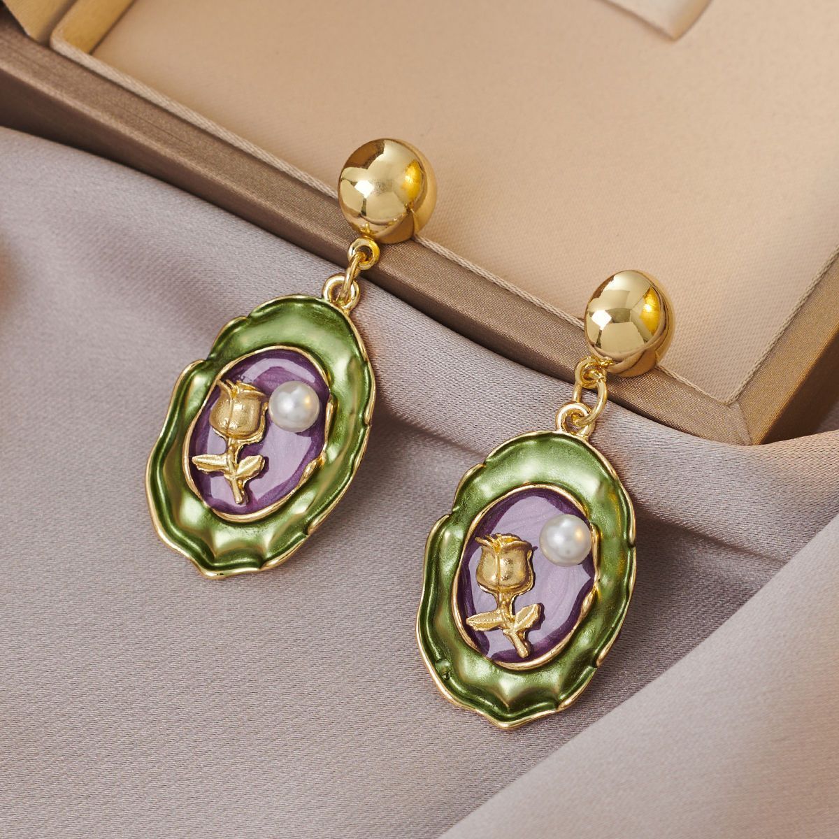 G77 earrings