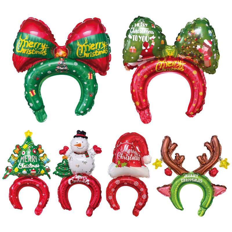 クリスマスのクリスマスツリーの老人雪だるまは棒のカチューシャの装飾品を持っています。|undefined