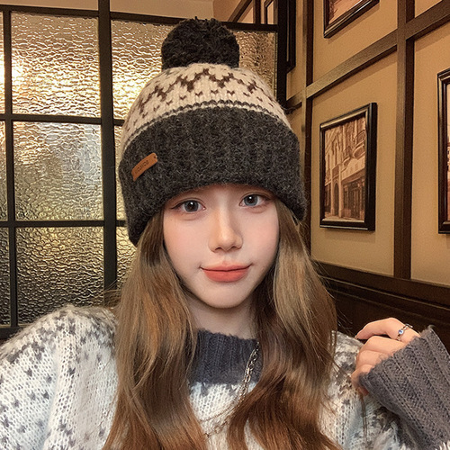 2024 new jacquard wool hat for women in autumn and winter ear protection, warm cold hat, cute hair ball knitted hat, big head circumference