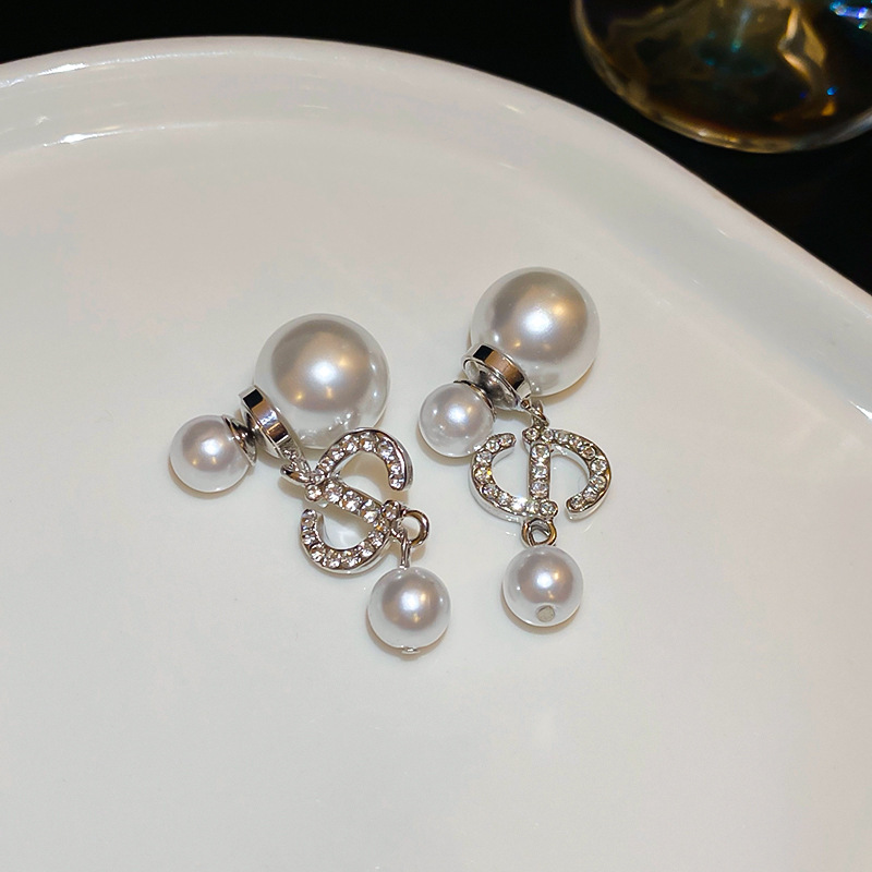 Pendientes de suministro de mercado nocturno de agujas de plata Pendientes de moda coreana en vivo Pendientes de estilo caliente Pendientes de lujo ligero Mujeres de alta gama