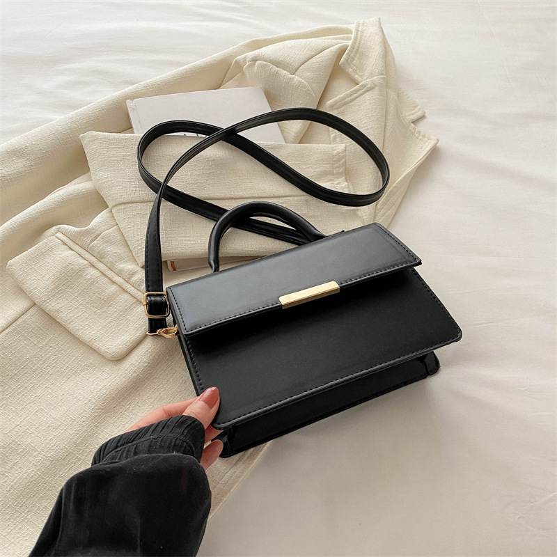 Este año la nueva explosión de bolsos de mujer de alta calidad sensación extranjera bolsos de mano versátiles ligeros de lujo nicho bolsos de hombro de un solo hombro