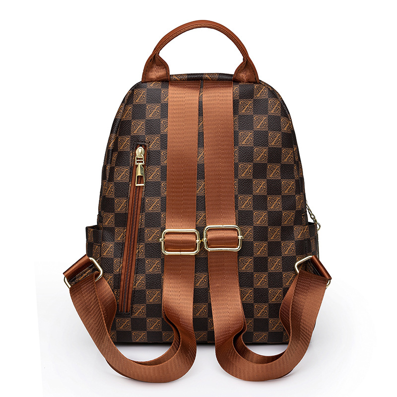 Spot al por mayor 2023 invierno nuevas señoras retro PU mochila de viaje de color de contraste de moda mochila escolar