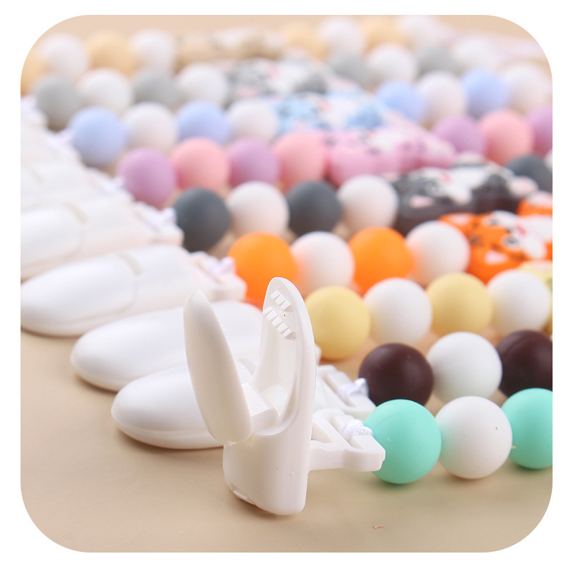 Amazon nuevo clip de pezón de plástico para bebés animados animales gatos calmar silicona bebé molar cadena de pezón