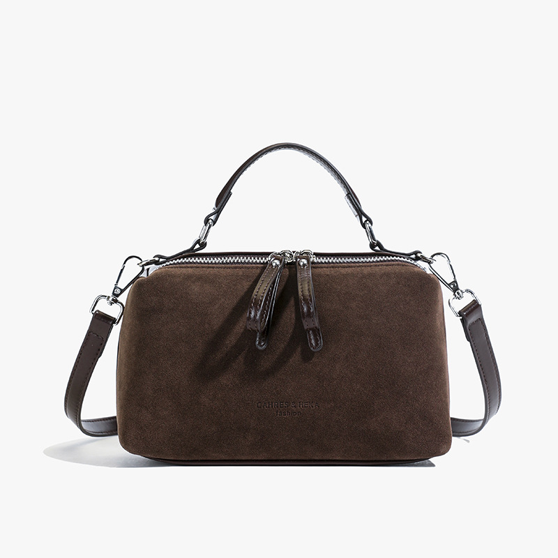 Invierno de moda mochila de textura esmerizada para mujeres 2025 nueva bolsa de hombro de mano casual de alta calidad sensación versátil mochila