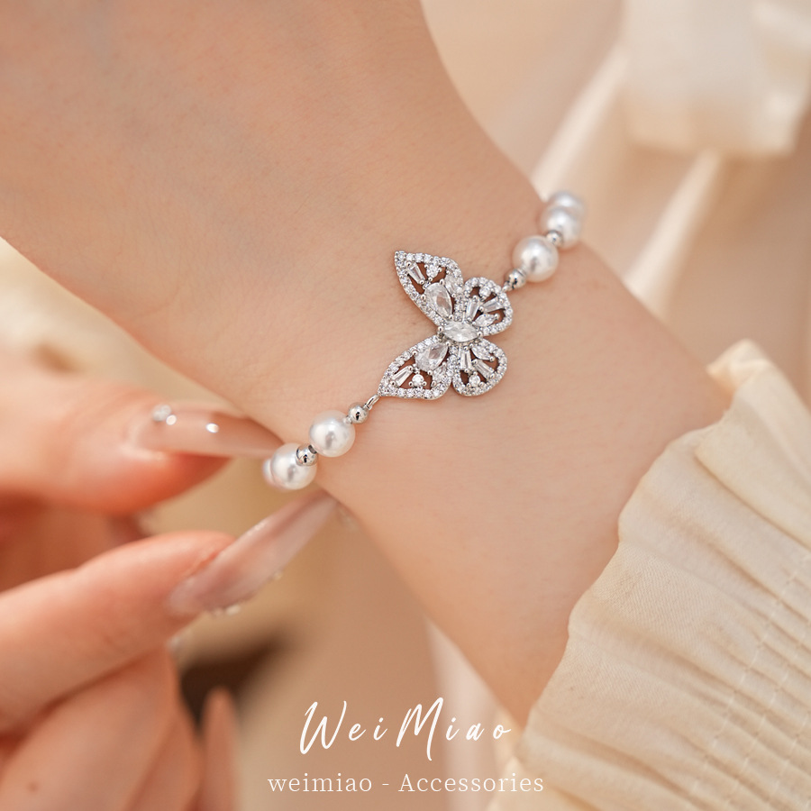 Brazalete de perlas mariposa con cuentas de diamante ligero lujo nicho pulsera de alta sensación temperamento exquisito joyería diaria universal