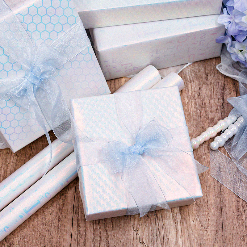 Papel de regalo de color azul de cebollas doradas transfronterizas regalo de cumpleaños del día de San Valentín de alto nivel de papel de embalaje de caja de regalo