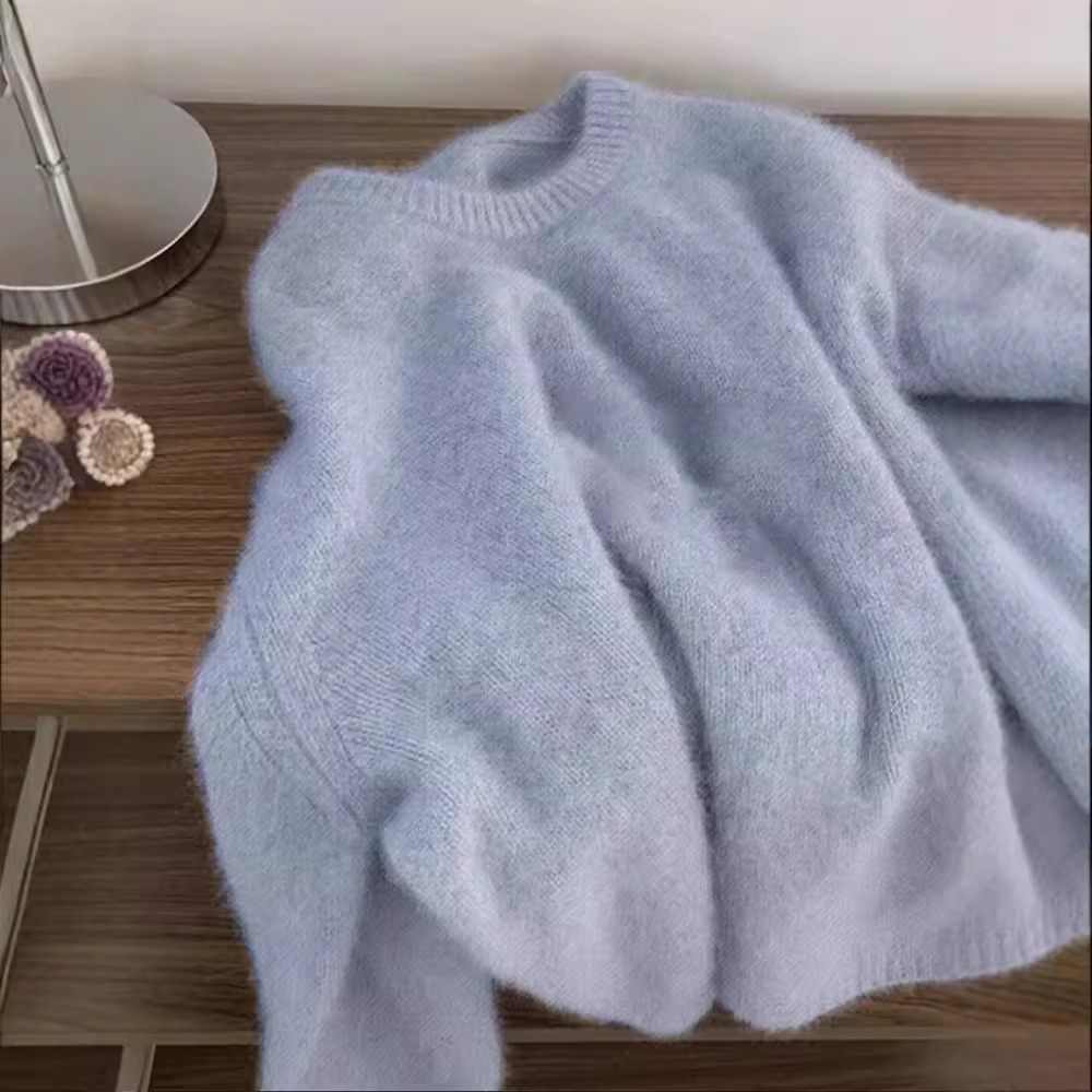 高級感の柔らかいモチモチのアライグマの丸首のセーターの女性の冬の厚い怠惰な風の乳のfufuの中でニットの上着を掛けます。