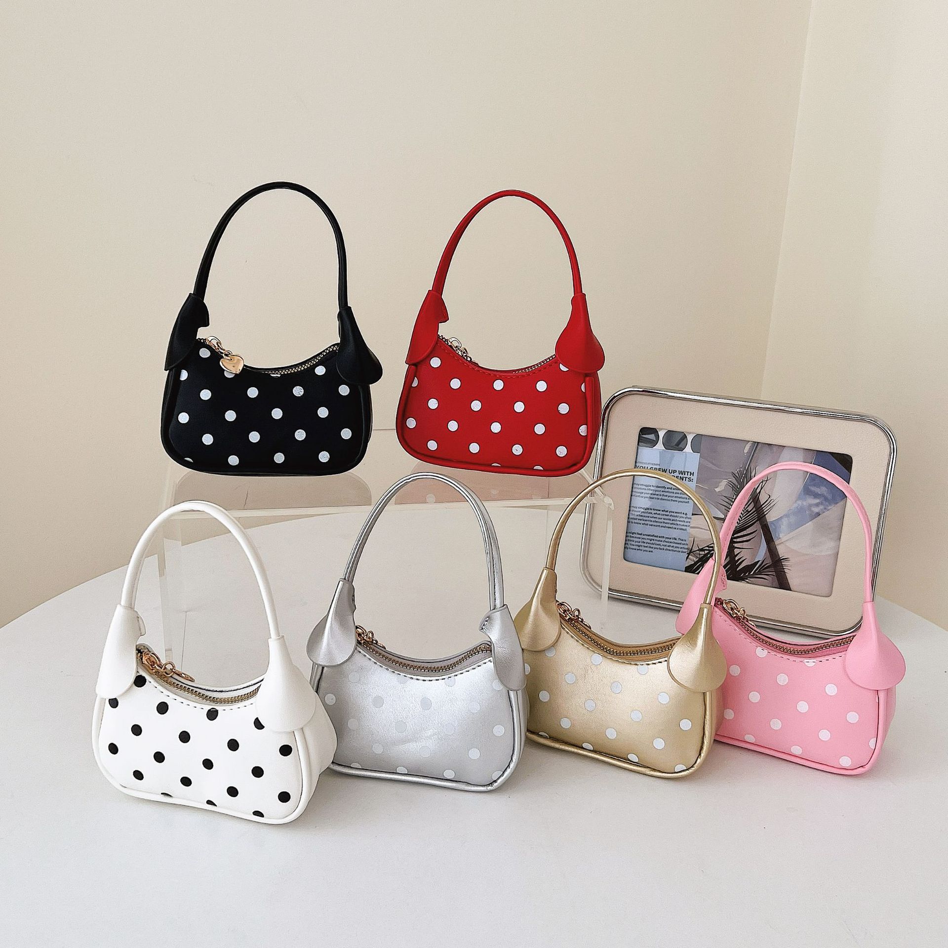 Cross-border high-end stylish polka dot handbag for women, 2026 new niche design underarm bag, shoulder and crossbody bag