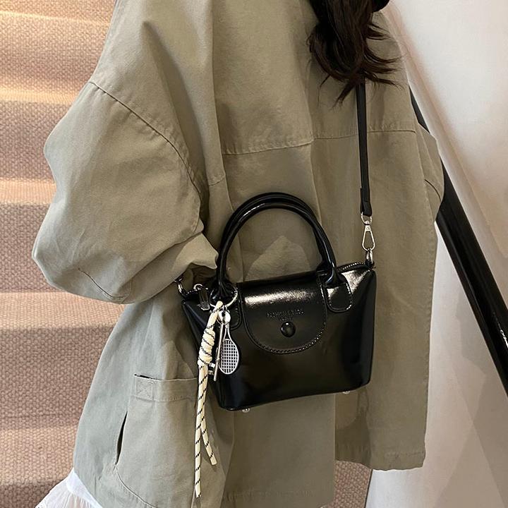 Bolso de mano retro coreano para mujeres 2025 nuevo estilo simple bolso de hombro de moda nicho de alta calidad bolso de mochila
