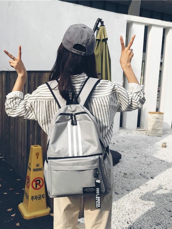 Nueva lona de tres barras mochila de moda coreana mochila de escuela secundaria mochila de viaje para hombres y mujeres mochila de escuela secundaria