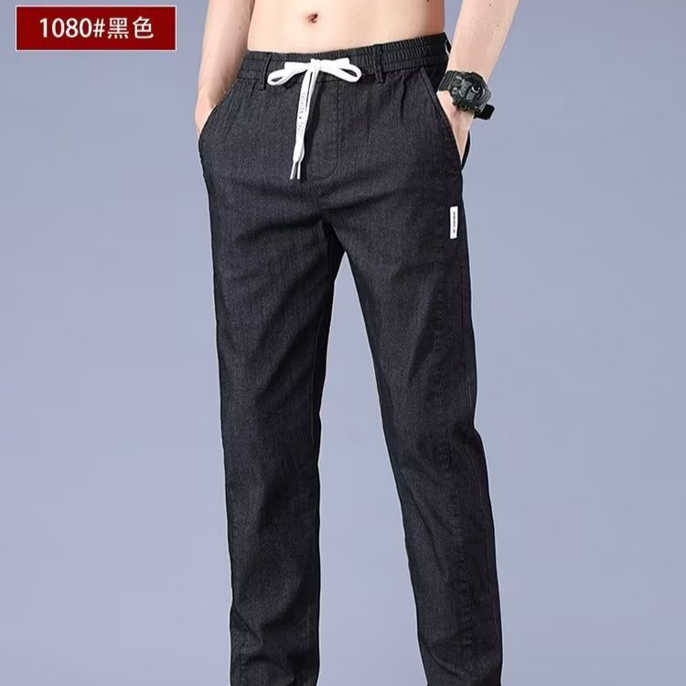 2024 modelos de primavera y otoño nueva moda de mezclilla de imitación de todo fósforo pantalones rectos delgados pantalones casuales sueltos de todo fósforo hombres de moda