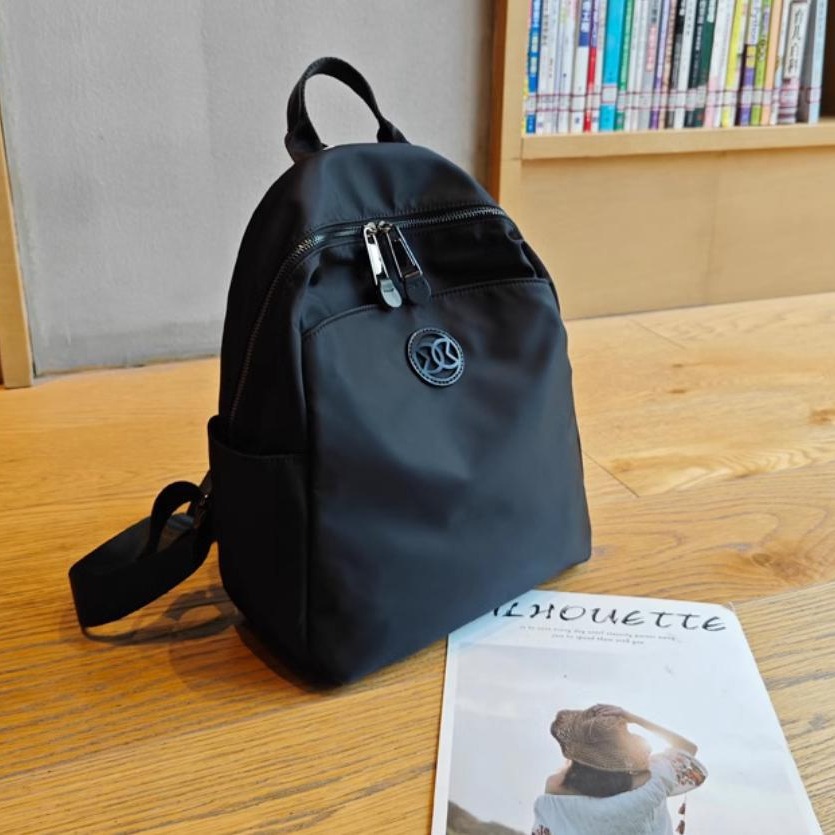 Mochila turística mujer 2024 nueva moda nicho de alta gama ligera bolsa de cercanías mochila de viaje bolsa de mamá