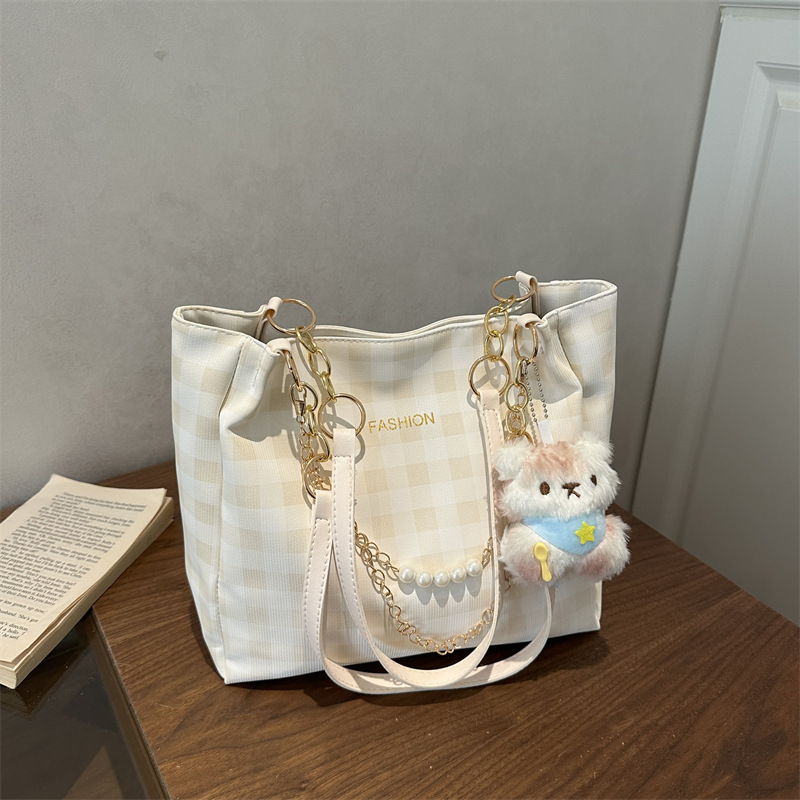 Bolsa de alto valor reticular para mujeres 2026 primavera y verano nuevo paquete de viaje de hombro universal bolso de nicho en línea bolsa de mujer