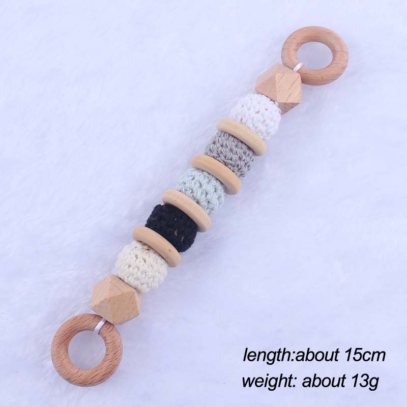 Nueva historieta del bebé haya amor mordedor juguete DIY macaron gran bola de lana mordedura pulsera