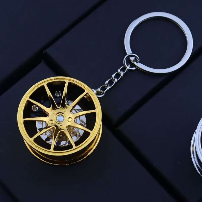 골드 휠 블랙 브레이크 패드