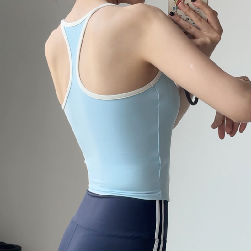 ヨガのベストの女性韓国のフィットネスは震動防止の細いベルトの一体の胸のパッドを集めて外にファッションの美背のランニングのブラジャーを着ます。