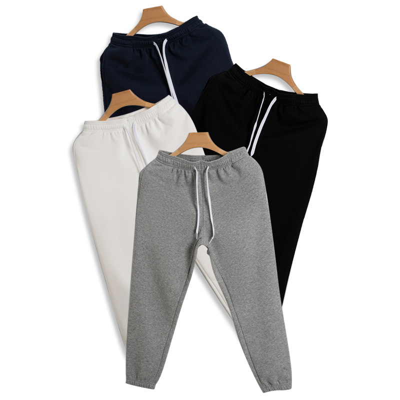 De gama alta de 430g de lana forrada engrosada Pantalones deportivos de otoño e invierno de los hombres Nuevos pantalones sueltos de algodón atado al tobillo pantalones casuales de chándal de las mujeres