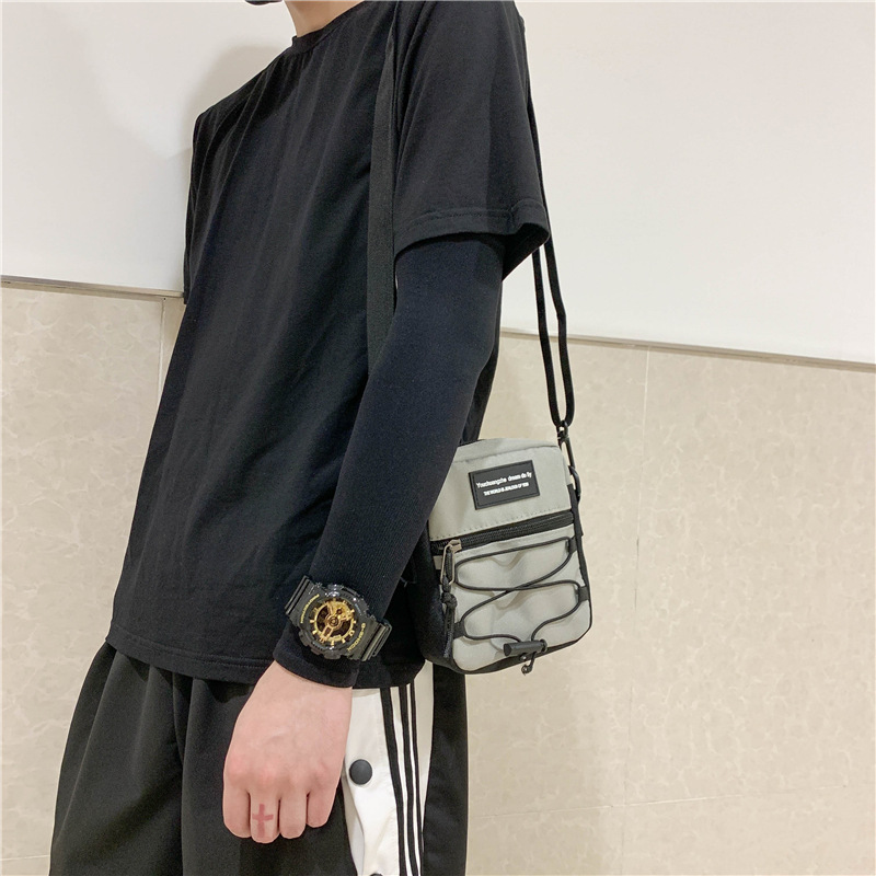 67g Weight Zipper Closure Type Single Shoulder Strap Strap Type Crossbody Bag Bags Type Nylon Material Letter Pattern Streetwear Style Square Shape Khaki, Light Grey, White, Black Color Small Size Small Nylon Letter Streetwear Square Zipper Crossbody Bag 55
