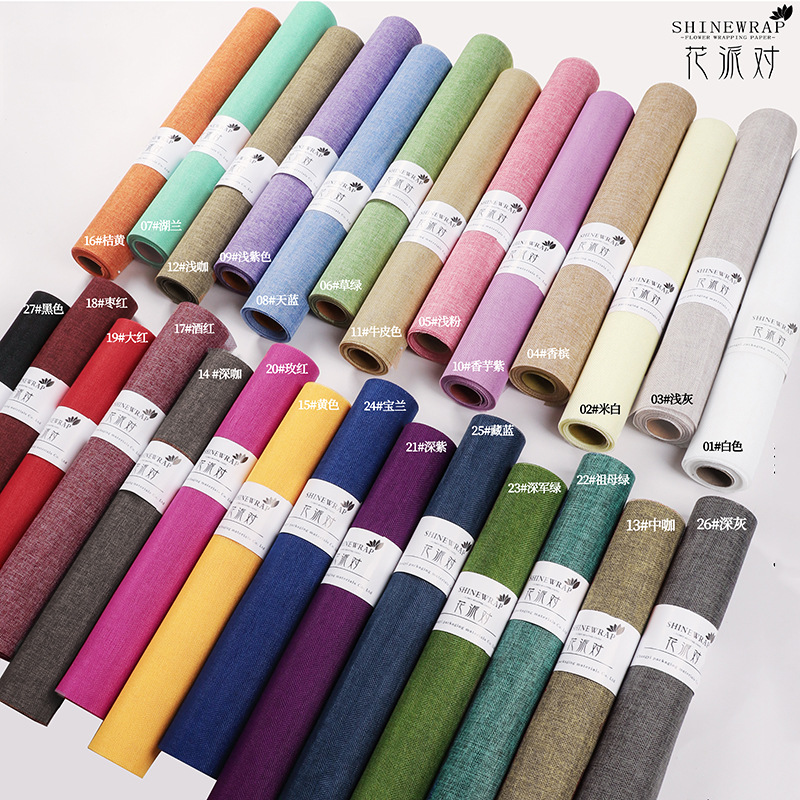 Fábrica de fiestas de flores al por mayor de color sólido enrollar hilo de red flor envasado tela de red florista ramo de flores envasado hilo de red colorido lino rollo