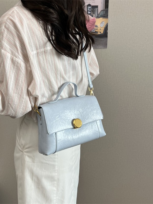 Bolso de mano de alta sensación para mujeres 2026 verano nuevo nicho de lujo ligero bolso cuadrado retrógrado ocio mochila de hombro