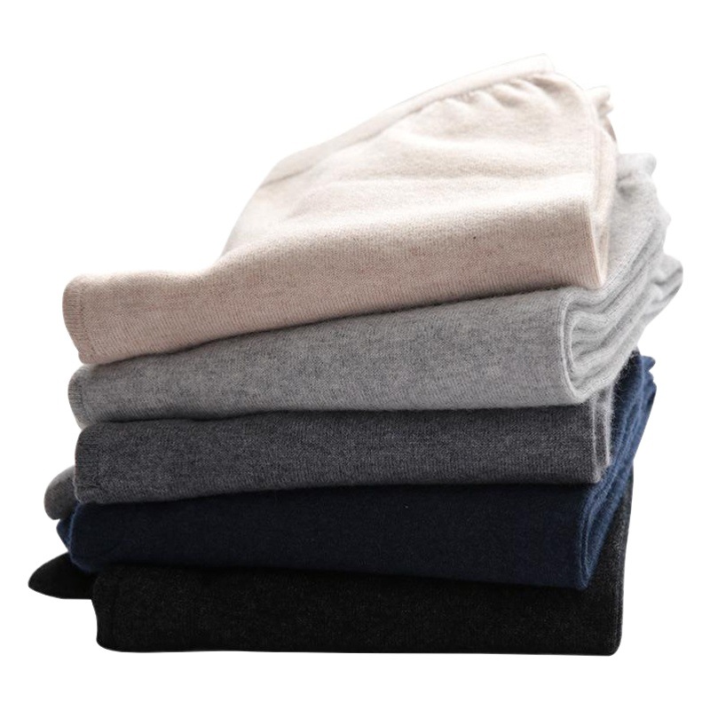 秋冬の新型男性のカシミヤのズボンの薄いタイプのシームレスな女性の弾力性の修身のヤギのズボンのメリヤスの底のズボン