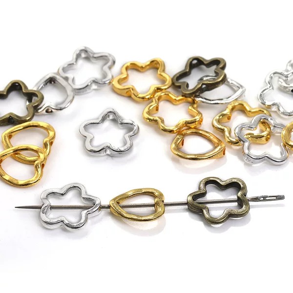 DIY retro alloy accessories plum blossom love hole bead pendant handicraft jewelry accessories