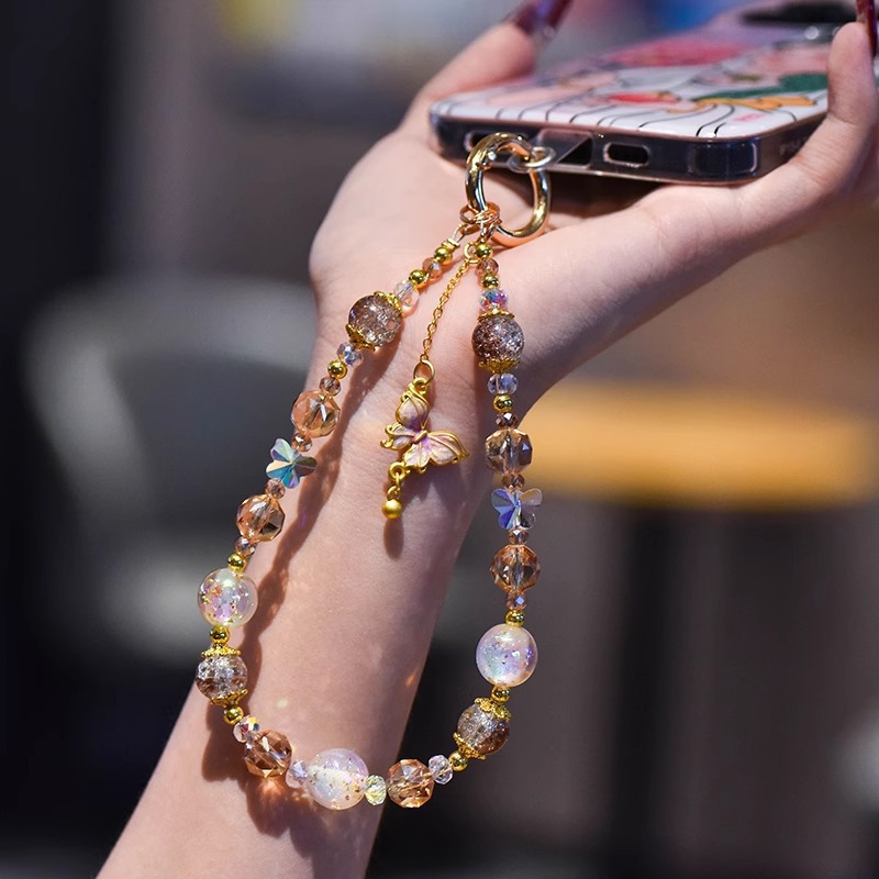 Nuevo estilo chino de alta calidad cadena de teléfonos móviles cristal ligero lujoso viento dorado colgante mariposa frillera corta cuerda de caso de teléfono móvil