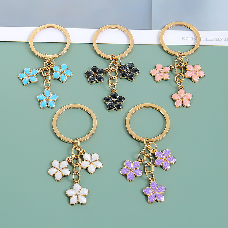 Metal small flower key chain pendant cute car key ring accessories female gift bag accessories small pendant