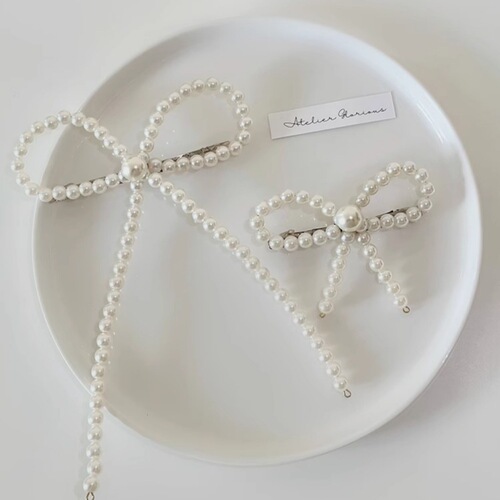 Korean-style pearl butterfly bow forehead hair clip for women, minimalist elegant high-end design edge clip, elegant versatile hair accessory trend