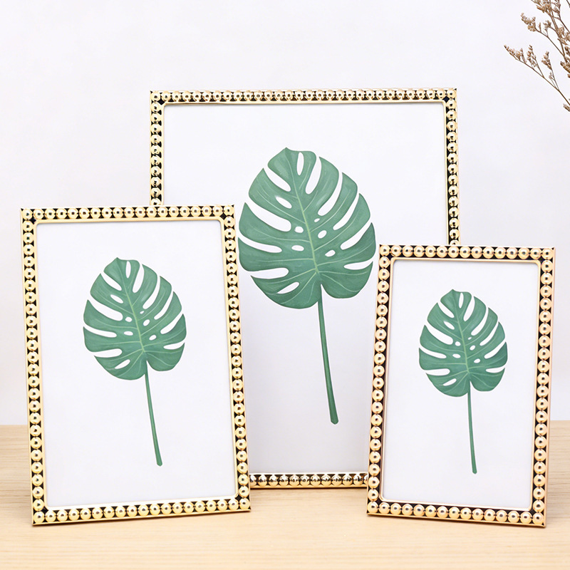 Cross-Border Wholesale Simple Small Round Bead Metal Photo Frame Stand, Stylish Gold Minimalist Home Decoration Photo Frame Cross-Border Wholesale Simple Small Round Bead Metal Photo Frame Stand, Stylish Gold Minimalist Home Decoration Photo Frame