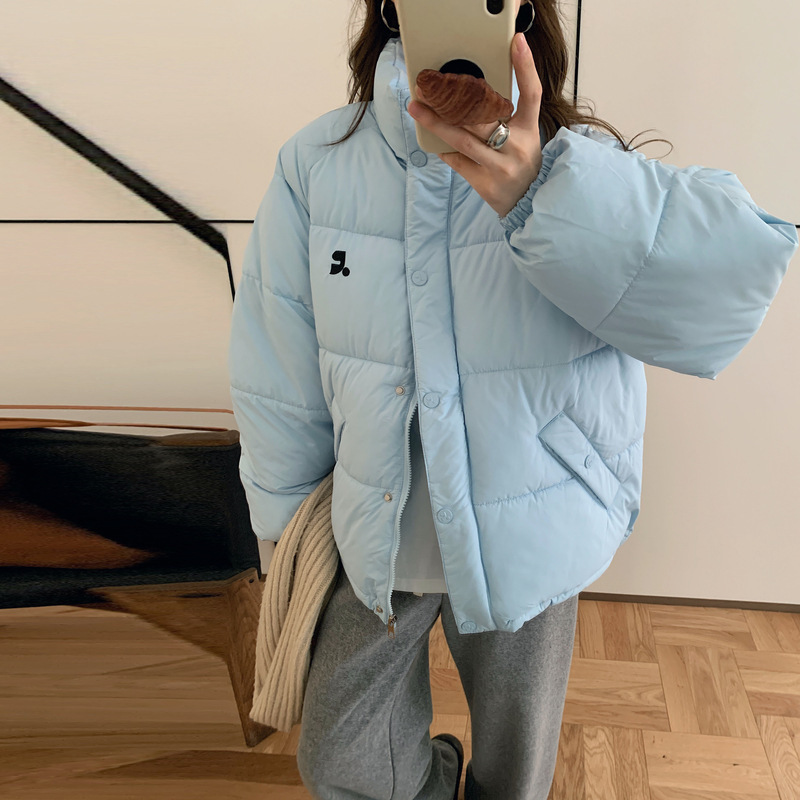 Corea del invierno 2025 nuevo pan plumón ropa de algodón mujer corta pequeña chaqueta de algodón de cuello holgado coreano