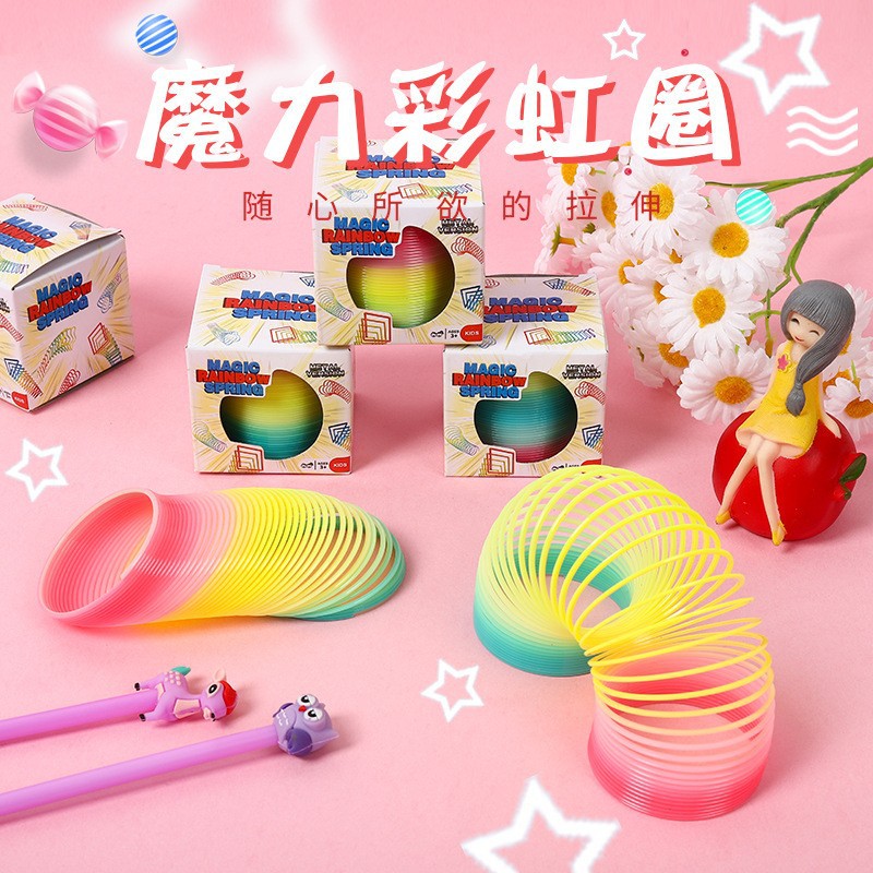 Medium boxed rainbow ring stacking music 6.5*6CM children's spring ring best selling stall toys wholesale