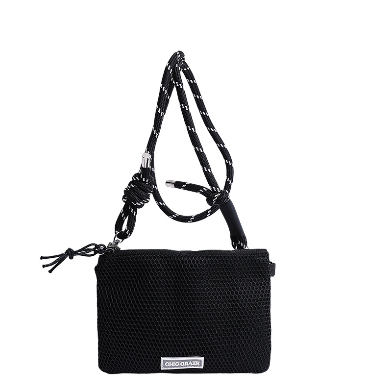 Bolsos pequeños de moda coreana 2025 verano nuevo estilo bolso femenino bolso de hombro de malla hueca bolso de mensajero de letras casuales marea