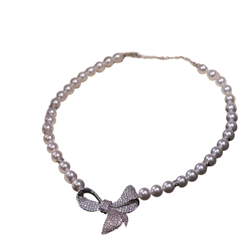 Elegant retro trend fashionable necklace with zircon with bow from…