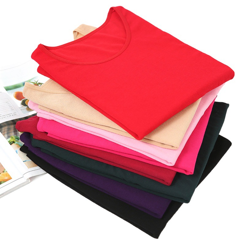 Ropa interior térmica de alta elasticidad con retención de calor de tres segundos para mujer, conjunto de top y pantalón de cuello redondo de color sólido, delgado y cálido para invierno, a la moda.