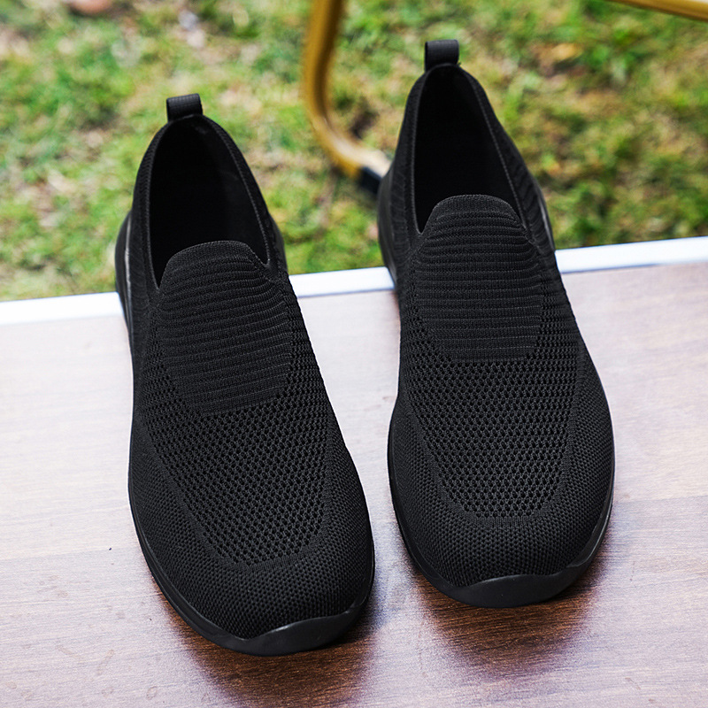 Zapatos de hombre de primavera de un pie de calzado de calzado ligero con suela suave zapatos de marcha transpirables zapatos de malla hueca cómodos zapatos de moda casuales