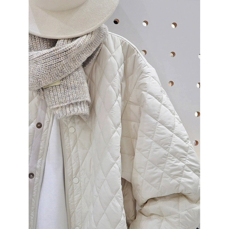 White light and thin quilted demi-season long down jacket with down, increased thickness, oversize