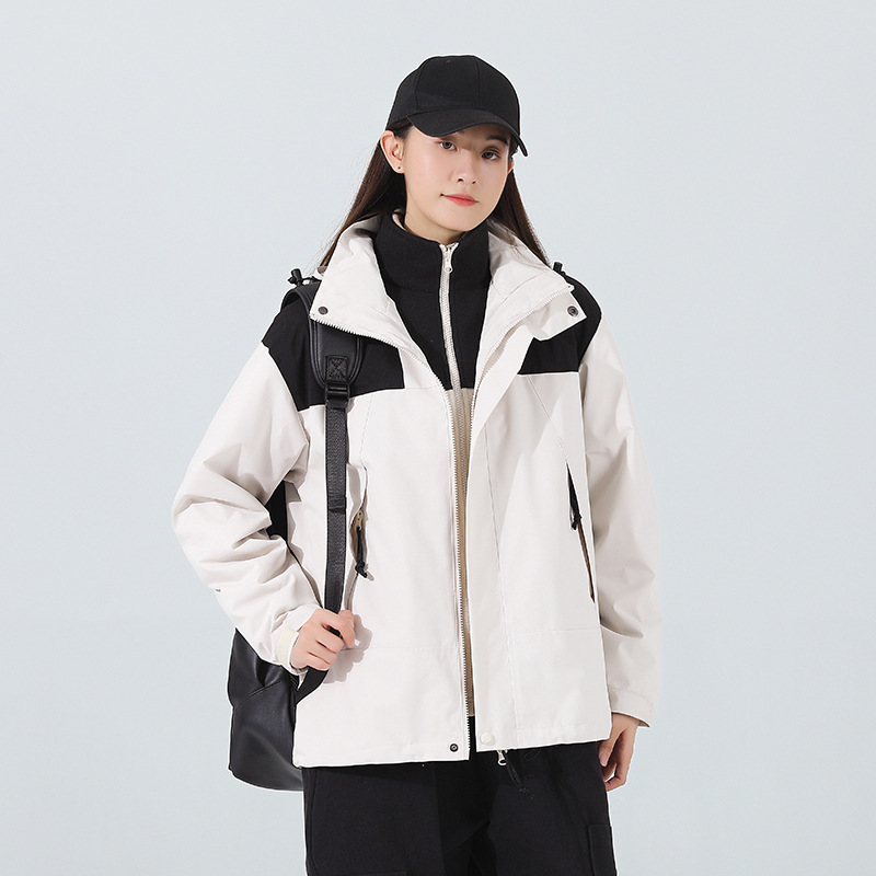 Chaqueta de invierno al aire libre para hombres y mujeres tres en uno de dos piezas de lana engrosada chaqueta de alpinismo a prueba de viento al por mayor en vivo