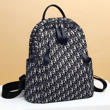 双肩包包女2025新款背包女时尚通勤大容量帆布旅行初中生书包箱包