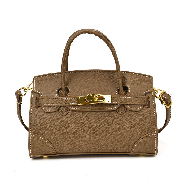 Coreano simple color sólido bolso de hombro para niños y niñas pequeño mini bolso de mano bebé nuevo bolso de comercio exterior transfronterizo para niños